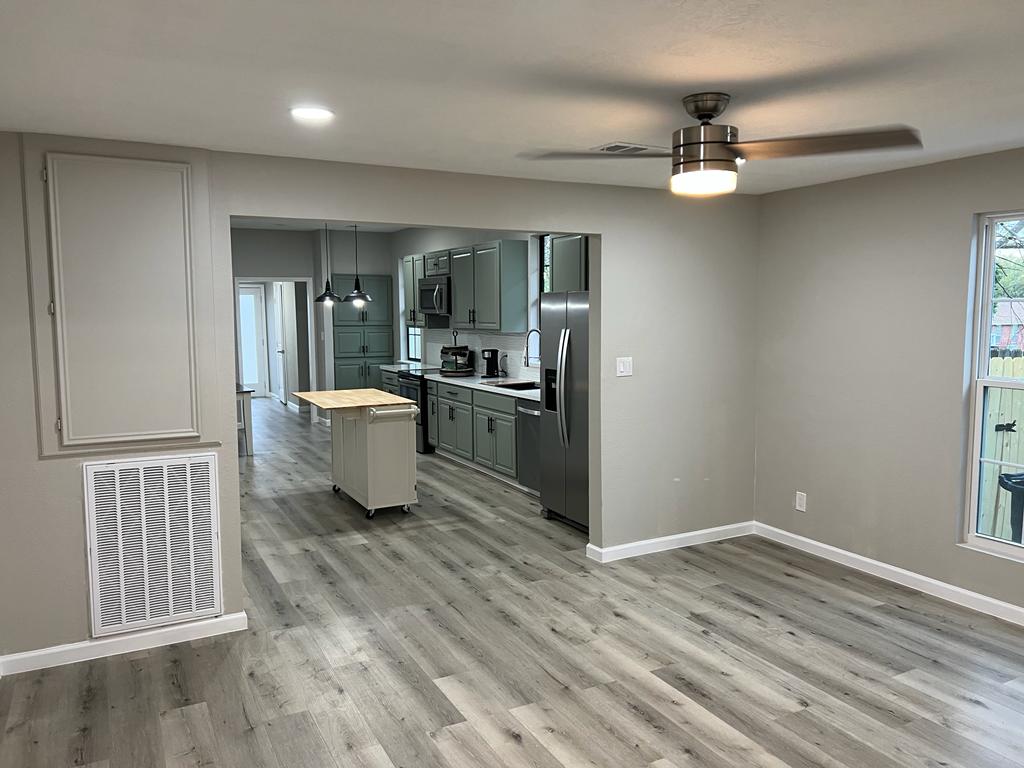 Kitchen and open living area from a documented PGC residential remodel