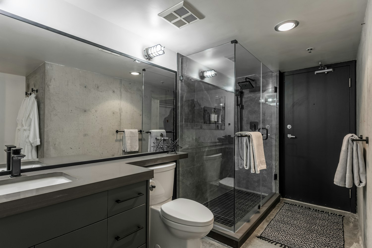 Clean contemporary bathroom with tile work and neutral material palette