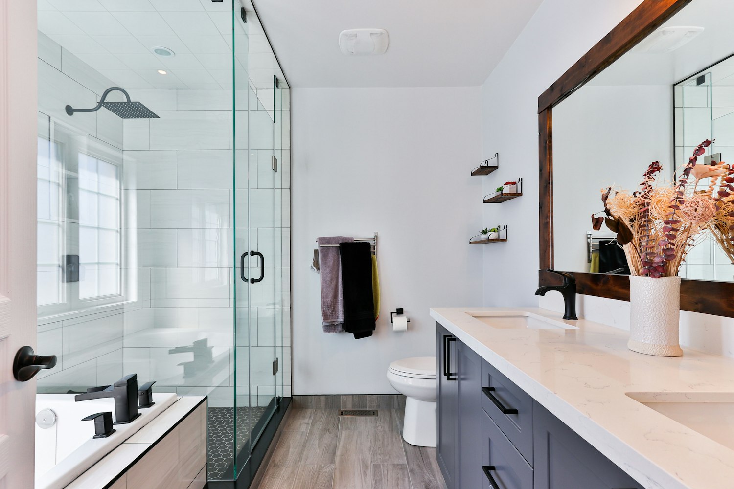 Bathroom shower remodel — modern walk-in shower with glass enclosure