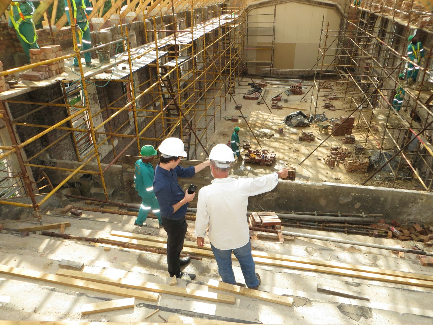 Commercial roofing and structural repair crew on an active job site — Houston commercial roofing