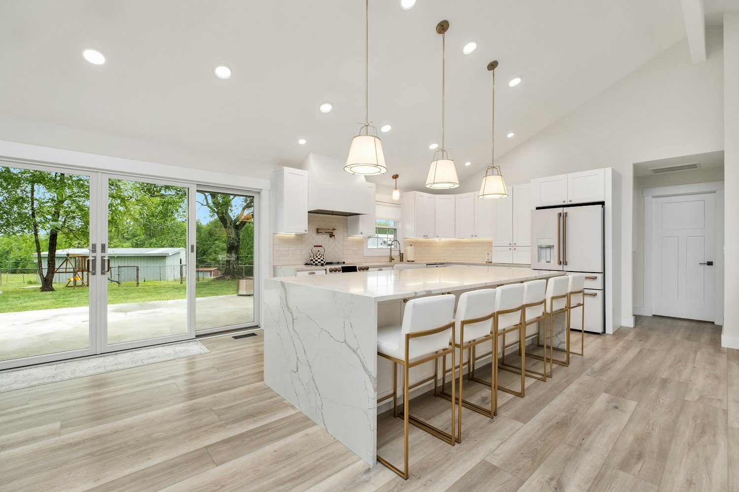 Kitchen island and open-concept living area — modern kitchen remodel — Houston general contractor